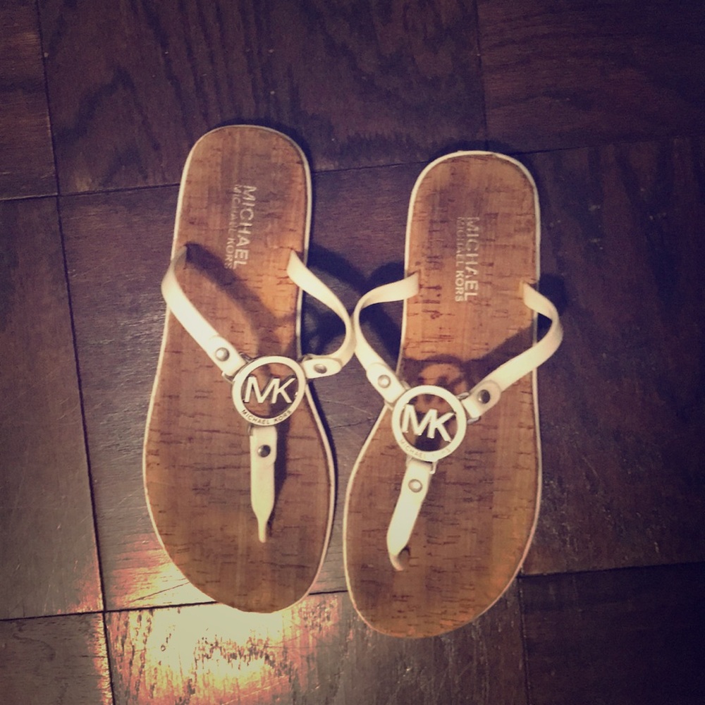 Michael Kors white sandals.